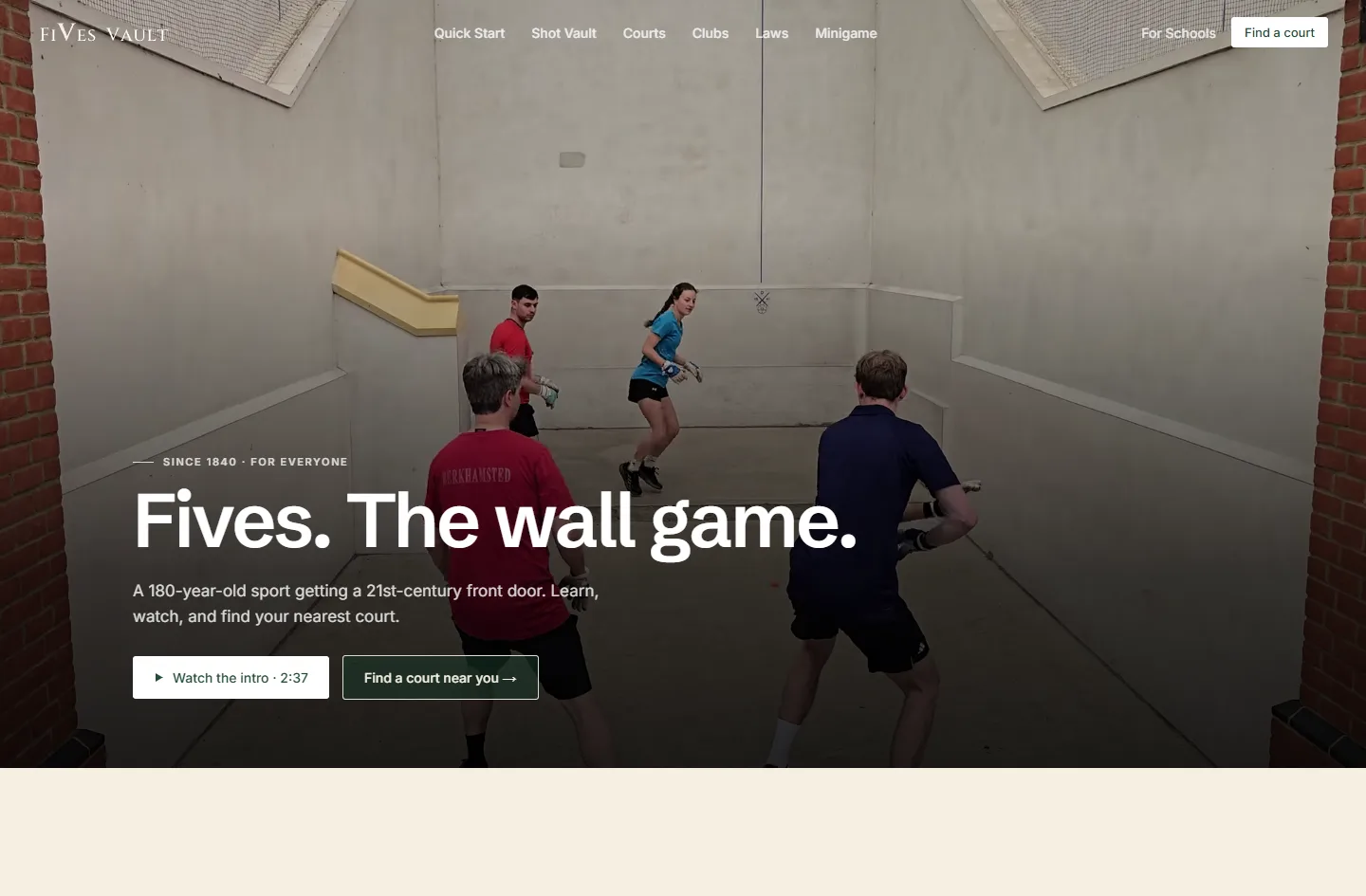 The Fives Vault homepage, a large hero photo of players on a fives court under the headline 'Fives. The wall game.'